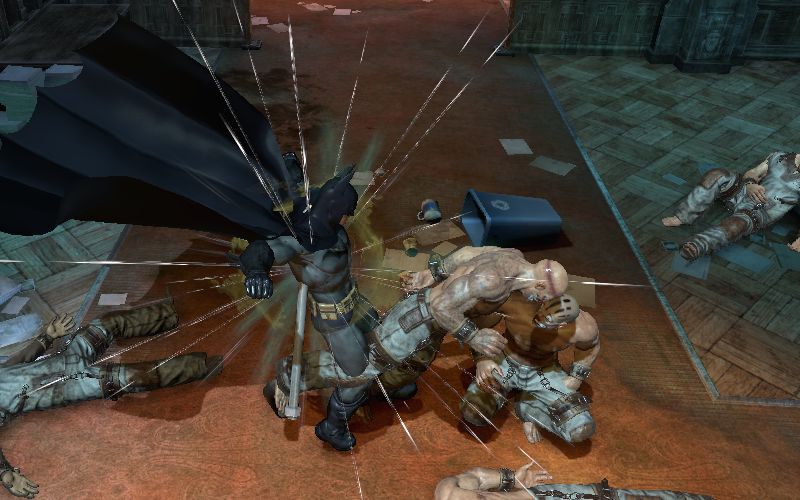 What is Batman doing to this guy?
