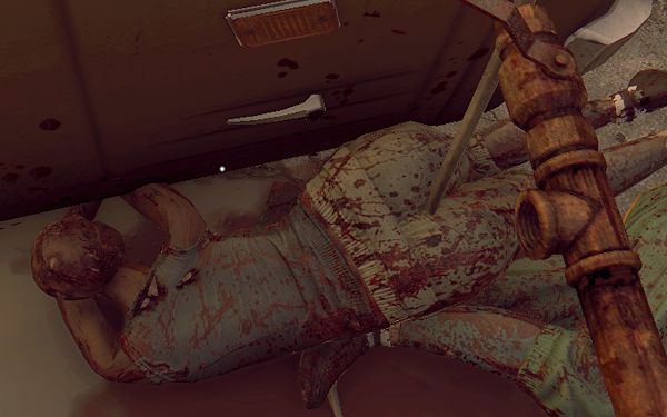This zombie has a metal rod up her arse