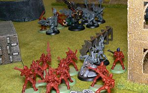 The 'High Elves' can do little but watch as the 'Orc Marauders' massacre their allies