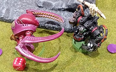 The Warboss krumps the Carnifex